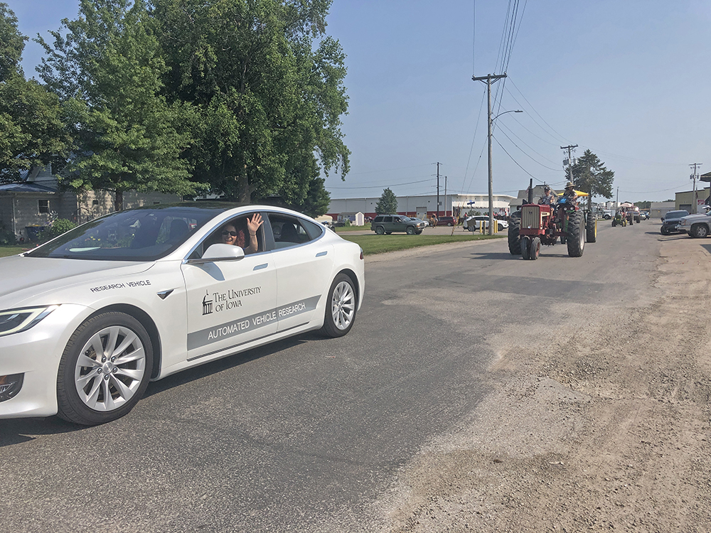 Tesla research vehicle in the Hills, Iowa, parade